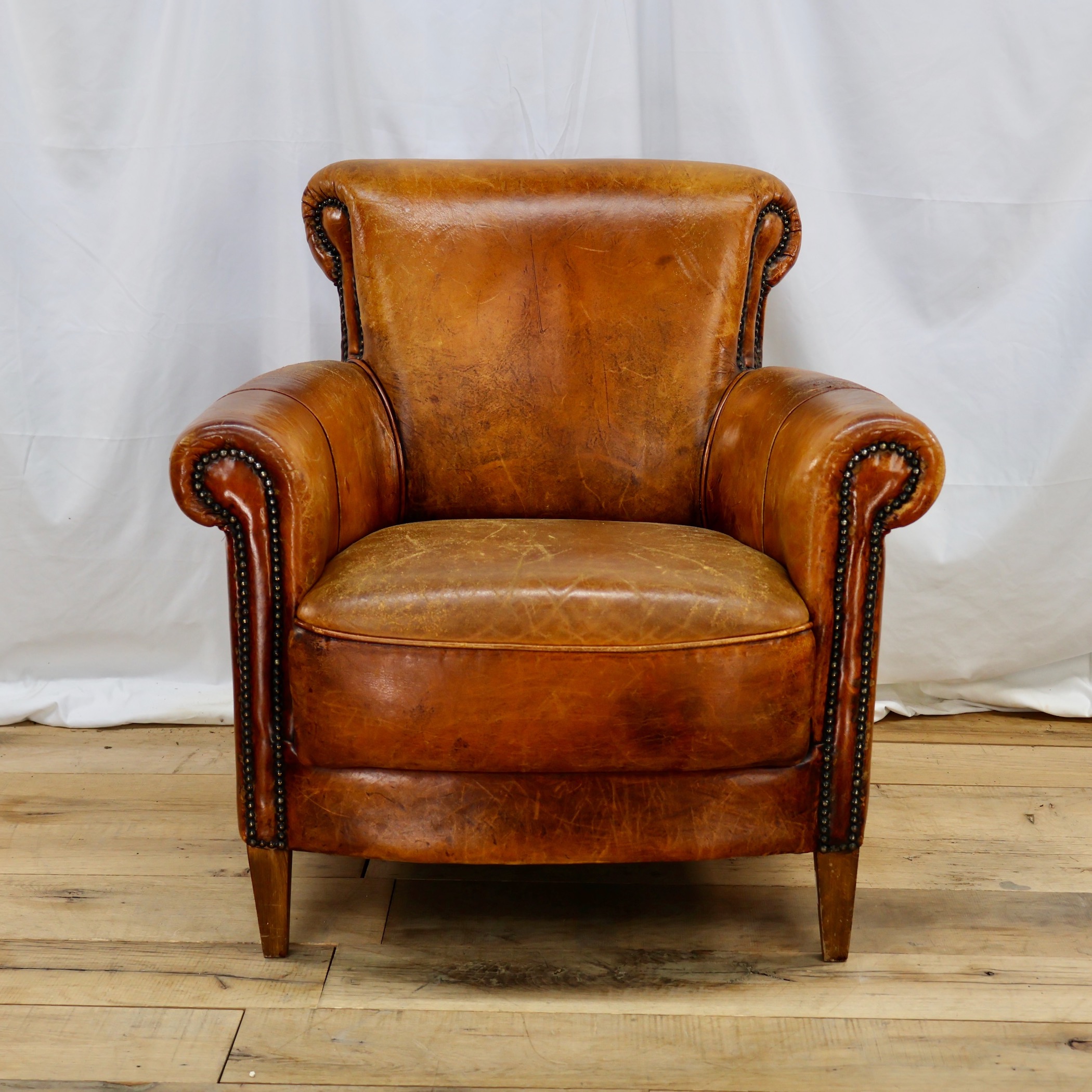 CHR517 ROLLED BACK LEATHER ARMCHAIR