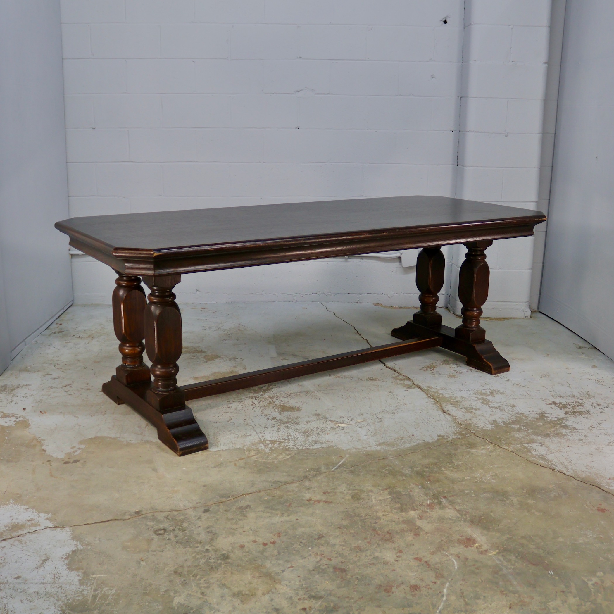 TB081 DARK WOOD TABLE WITH TURNED TRESTLE BASE 6'10