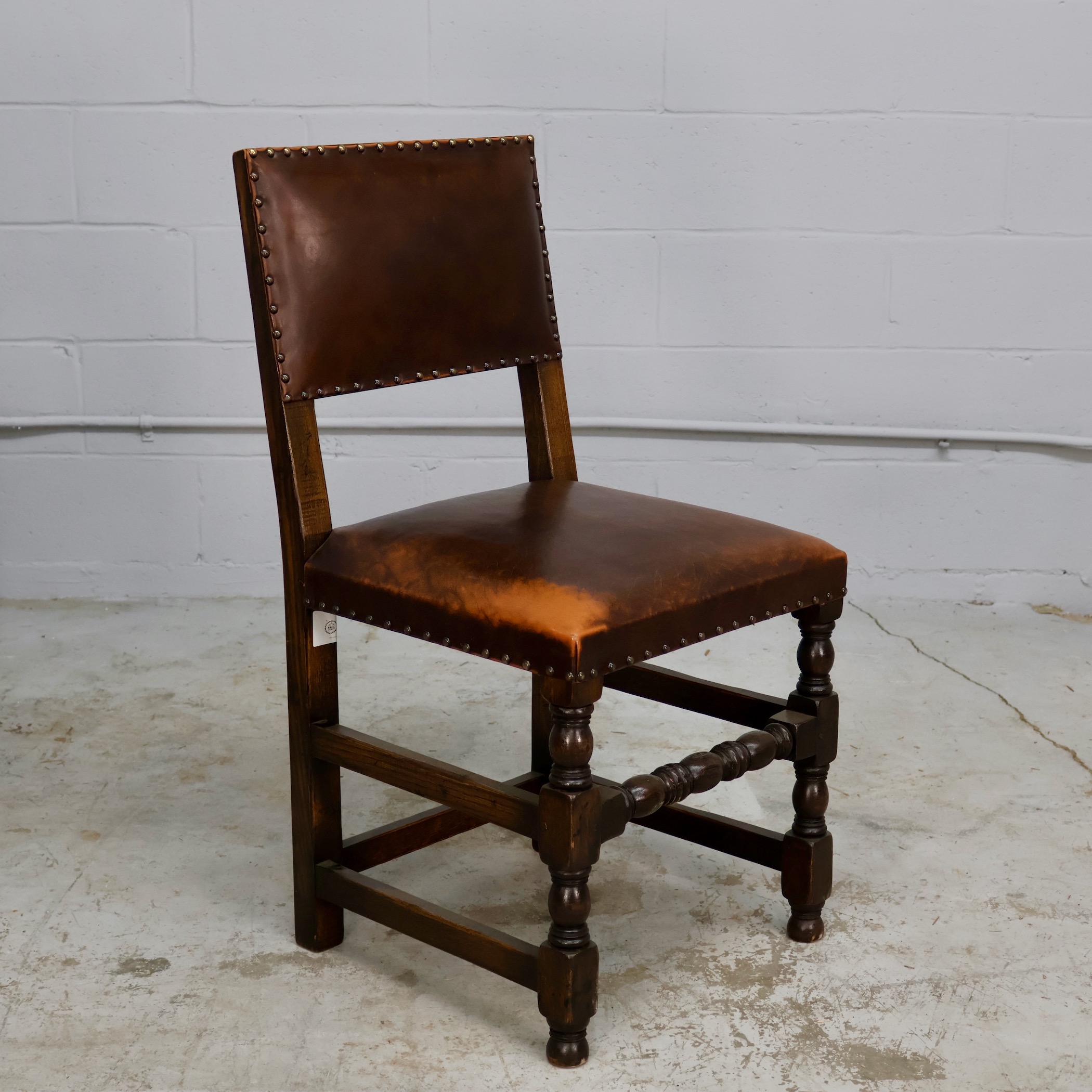TB02 LEATHER AND TURNED WOOD CHAIRS