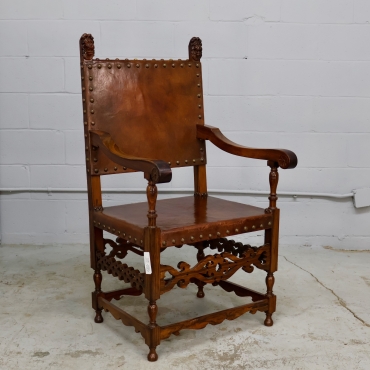 CHR280 ORNATE LEATHER AND CARVED WOOD ARMCHAIR